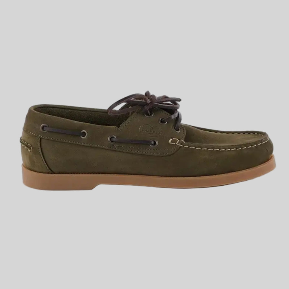 Green boat shoe on a white background