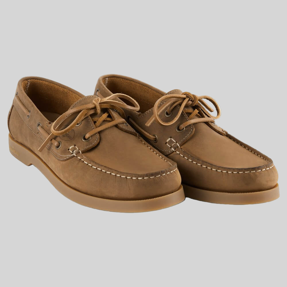 Pair of brown leather shoes on a white background